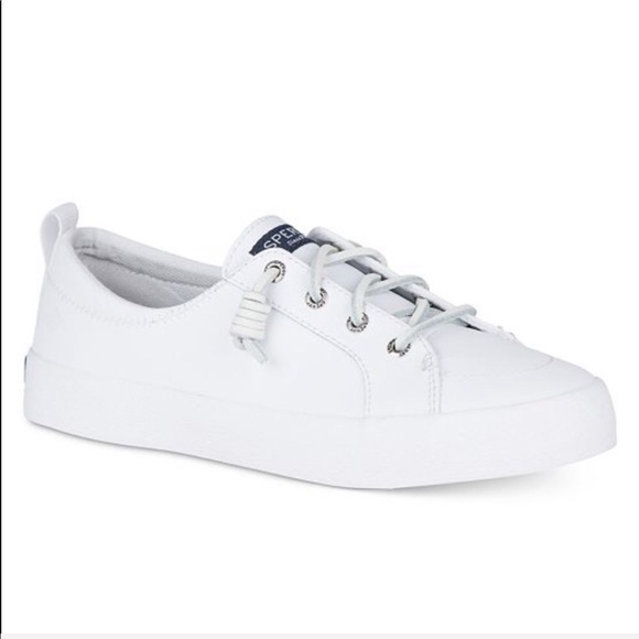 white sperry slip on sneakers